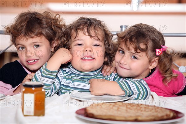 Three sisters enjoying crepes.