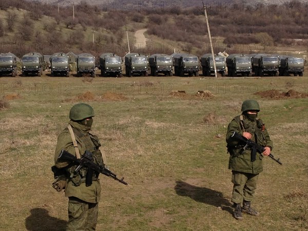 Crimea, Ukraine. 10th Mar, 2014. Russian forces patrol near Perevalne, in Crimea, Ukraine, on March 10, 2014, in the days before a referendum on whether to leave Ukraine and join Russia. After initially claiming not to be involved in the occupation of Crimea, Russia later admitted their troops had taken control of the region before the vote. © Matthew Schofield/McClatchy DC/TNS/Alamy Live News