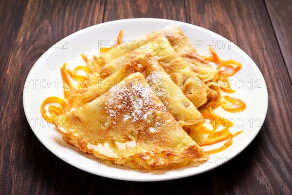 Crepes pancakes with orange sauce