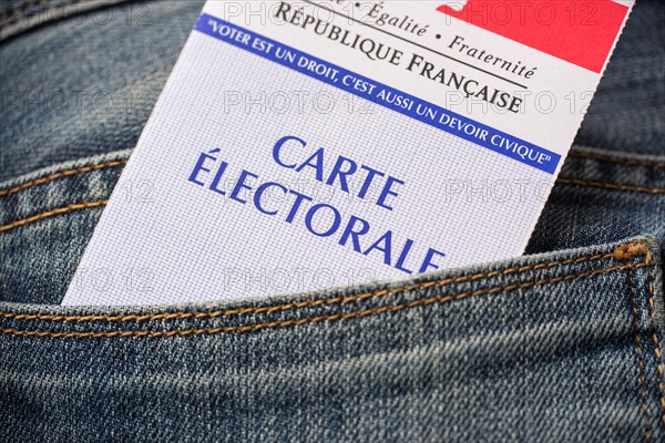 French electoral card in the rear pocket of a jeans, 2017 presidential elections concept