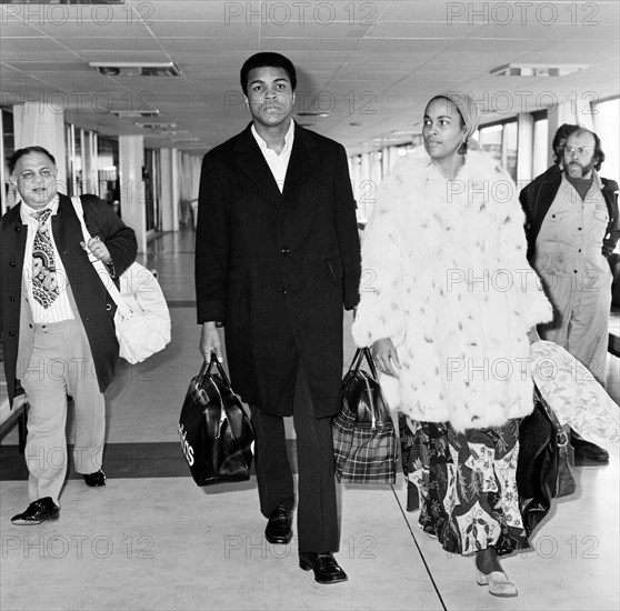 Boxer Muhammad Ali and wife Belinda at Heathrow Airport en route to Beruit from New York. 2nd March 1974