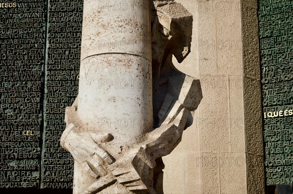 A sculpture of Jesus on the passion facade of La Sagrada Familia in Barcelona, Spain