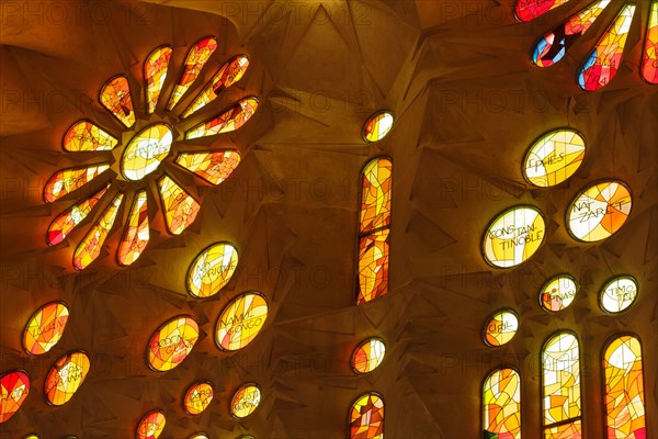 Stained-glass windows of the Sagrada Família (Basílica de la Sagrada Família) designed by Catalan modernist architect Antoni Gaudí in Barcelona, Catalonia, Spain. The stained-glass windows in the west clerestory were designed by Spanish glass artist Joan Vila-Grau since 1999.