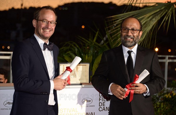 July 17, 2021, CANNES, France: Juho Kuosmanen and Asghar Farhadi pose with the 'Grand Prix' Ex-Aequo for 'Hytti nro 6' and for 'A Hero' during the 74th annual Cannes Film Festival on July 17, 2021 in Cannes, France. (Credit Image: © Frederick InjimbertZUMA Press Wire)