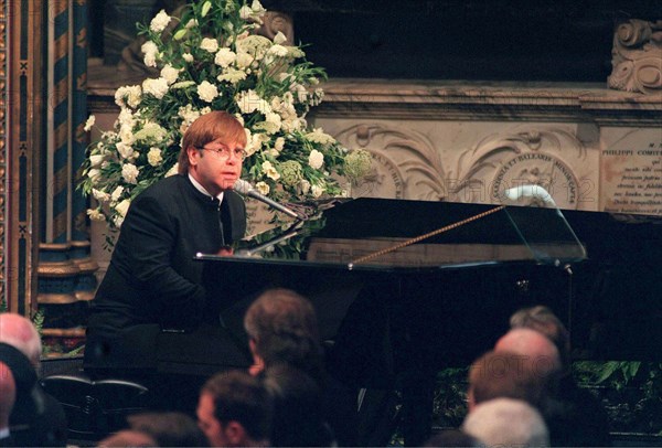 Sir Elton John sings 'Candle In The Wind' at the funeral of Diana, Princess of Wales on September 6, 1997 in London.