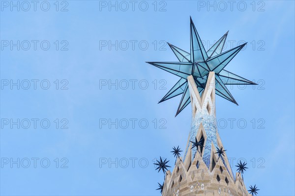 New star on the tower of the Virgin Mary in the Basilica of the Sagrada Familia. the second tallest of Barcelona iconic church