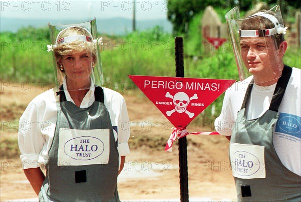 Princess Diana with mine expert Paul Heslop January 1997 in a land mine field in Huanbo Angola January 15 1997 during a visit to help a Red Cross campaign outlaw landmines worldwide