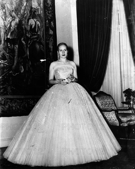 Eva Peron leaves for the theatre in a ball gown