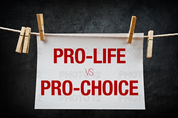 Pro-life vs pro-choice, female right on abortion concept
