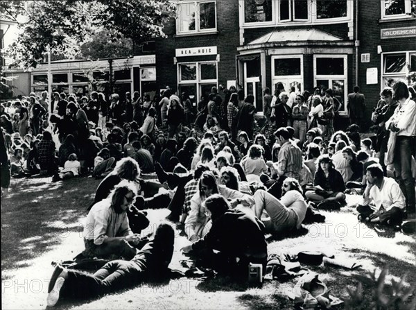 May 05, 1976 - Tension Grows Over The Closure Order Of The Only Dutch Abortion Clinic By The Dutch Minister Of Justice: The Dutch Minister of Justice has ordered the closure of the only abortion clinic at Heemstede, near Haarlem. The Dutch Parliament and a great number of ministers oppose the closure and are introducing a new bill to legalise abortion, which at the moment is forbidden by law. Photo shows Hundreds of Dutch people sit on the lawns of the abortion clinic at Heemstede as a protest against the closure order.