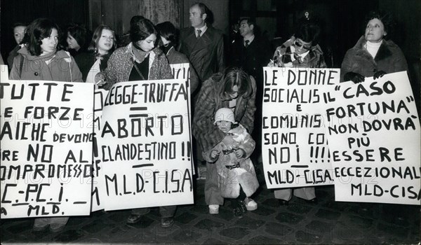 Feb. 26, 2012 - Abortion Rally - Many demonstrators took part in a rally organized by the Feminine Movement in front of the Parliament asking a law to introduce the free abortion in Italy. OPS:- Women seen with their various posters during the rally.