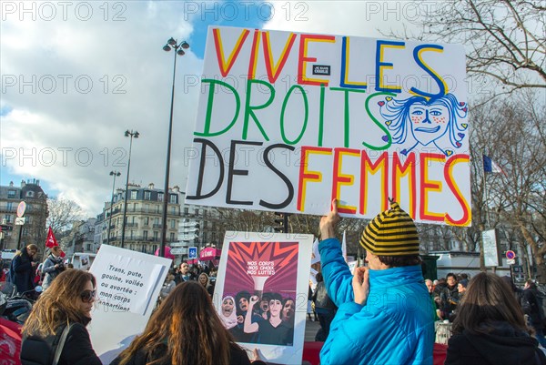Paris, France, Divers French N.G.O.'s Groups, Feminist Demonstration in Honor of 40th Anniversary of Abortion Law Legalization,,Holding French protest poster "Long Live WOmen's Rights" pro abortion rally