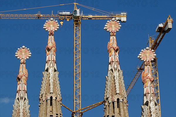 Artistic Tower of Sagrada Familia with crane