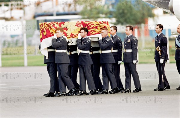 Diana, Princess of Wales Coffin arrives at RAF Northolt, South Ruislip, from Villacoublay airfield, France, Sunday 31st August 1997. The Queen's Colour Squadron, based at neighbouring RAF Uxbridge, acting as the bearer party, with the flight being met by the Prime Minister, Tony Blair, the Lord Chamberlain, Lord Lieutenant of Greater London, Secretary of State for Defence, the RAF Northolt station commander and the RAF Chaplain-in-Chief.