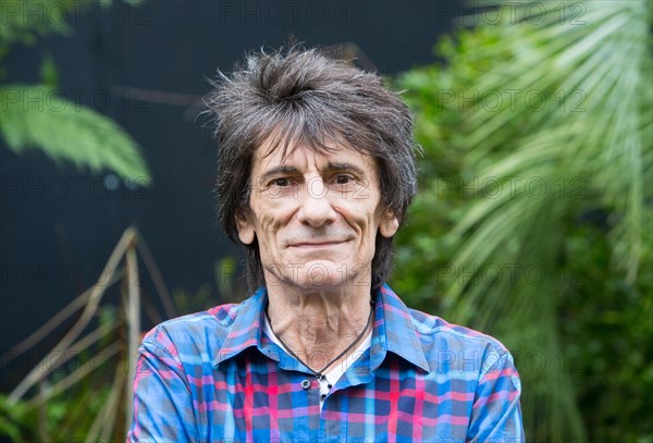 Rolling Stones guitarist,Ronnie Wood at the RHS Hampton Court Flower show at a stand supporting people with bowel cancer