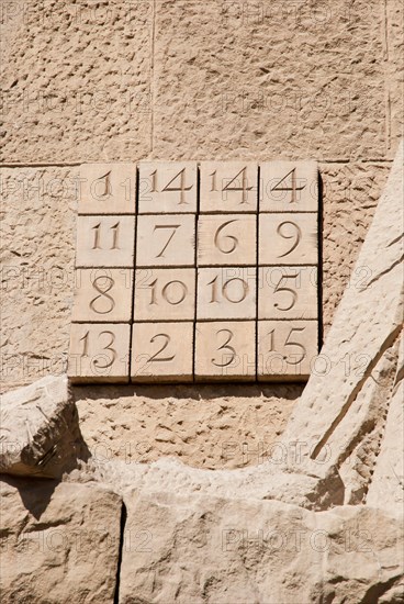 BARCELONA, SPAIN - MARCH 10: Magic number square on the passion facade of Sagrada Familia church, Barcelona, March 10, 2013.