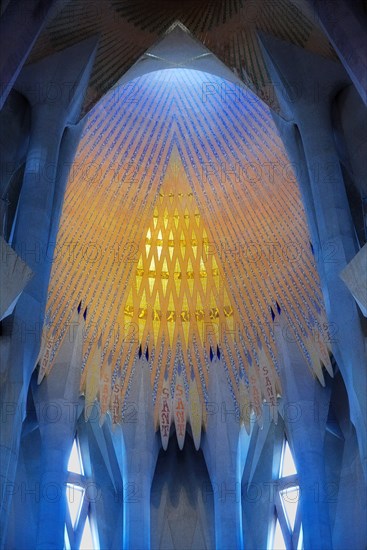 Sagrada Familia, interior, dome at crossing with inlaid colored tile & glass lit from above, by Antoni Gaudí (begun 1892), Barcelona, Catalonia, Spain