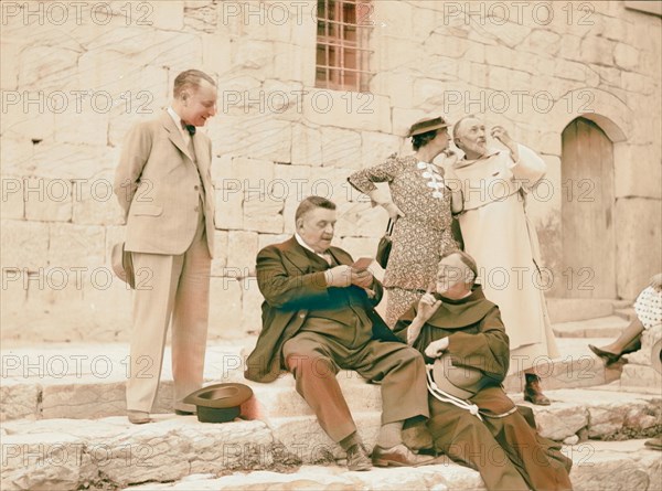 Monsieur & Madame Edouard Herriot visit to Jerusalem, May 11, 1938. Mr. Herriot & party in front of Church of Holy reimagined