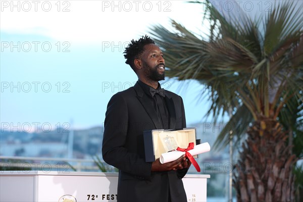 CANNES, FRANCE - MAY 25: Director Ladj Ly, winner of the Jury Price award for his film "Les Miserables" poses at the photocall for Palme D'Or Winner d