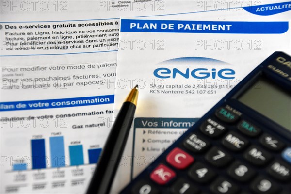 Marseille, France. 30th May, 2021. In this photo illustration, a pen and a calculator seen placed on an Engie gas bill.The regulated gas prices applied by Engie will increase by 4.4% on June 1, 2021: the increase will be 1.2% for customers who use gas for cooking, 2.6% for those who have a dual use (cooking and hot water) and 4.6% for gas-heated fireplaces. Credit: SOPA Images Limited/Alamy Live News