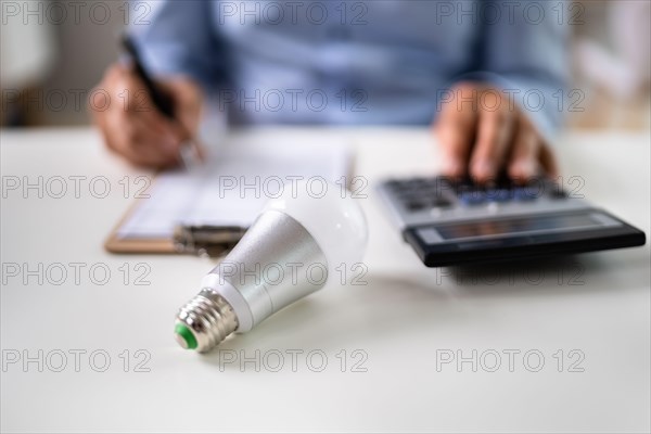 Light Bulb Finance Calculator And Saving Money