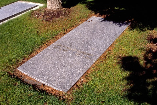 A view of the grave of writer Earnest Miller Hemingway in a grassy cemetery in Ketchum Idaho