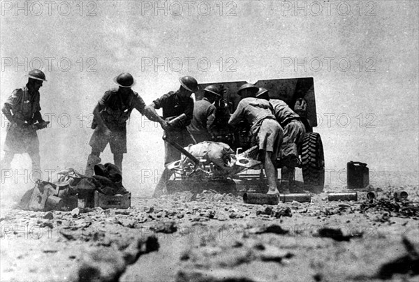 A 25 Pounder of the Royal Artillery seen here in an artillery duel with the Afrika Korps during the Battle for El Alamein in Egypt ;July 1942