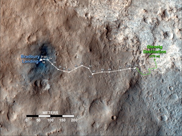 Curiosity's Travels Through Sol 56 This map shows the route driven by NASA's Mars rover Curiosity through the 56th Martian day, or sol, of the rover's mission on Mars (Oct. 2, 2012).

The route starts where the rover touched down, a site subsequently named Bradbury Landing. The white line extending toward the right (eastward) from Bradbury Landing is the rover's path so far, and the green line shows its planned future route. Numbering of the dots along the line indicate the sol number of each drive. North is up. The scale bar is 200 meters (656 feet). By Sol 56, Curiosity had driven at total distance of about 1,590 feet (484 meters).

The Glenelg area farther east is the mission's first major science destination, selected as likely to offer a good target for Curiosity's first analysis of powder collected by drilling into a rock.

The image used for the map is from an observation of the landing site by the High Resolution Imaging Science Experiment (HiRISE) instrument on NASA's Mars Rec...