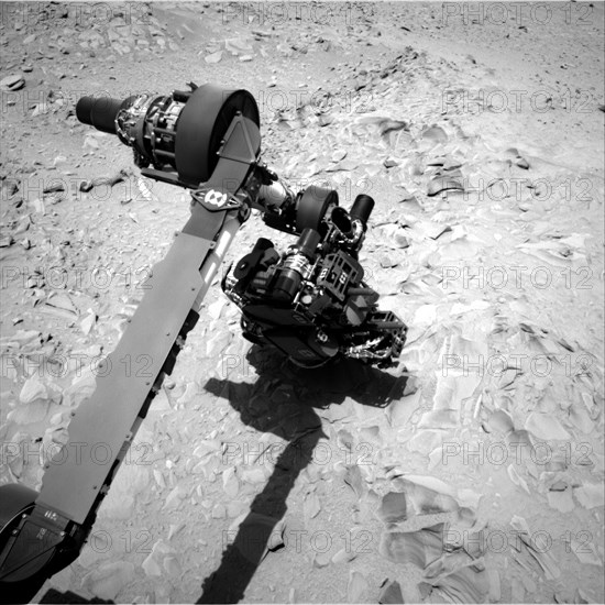 Inspection of Rock Target 'Bathurst Inlet'

This image was taken by Navcam: Left A (NAV_LEFT_A) onboard NASA's Mars rover Curiosity on Sol 54.

On Sol 54 (Sept. 30, 2012), Curiosity used two tools at the end of its arm to inspect two targets on an angular rock called "Bathurst Inlet." The rover had driven 7 feet (2.1 meters) the preceding sol to place itself within arm's reach of the targets. Curiosity took close-up images of Bathurst Inlet with its Mars Hand Lens Imager (MAHLI), and took readings with the Alpha Particle X-Ray Spectrometer (APXS) to identify chemical elements in the target. MAHLI also inspected another location within reach, "Cowles."