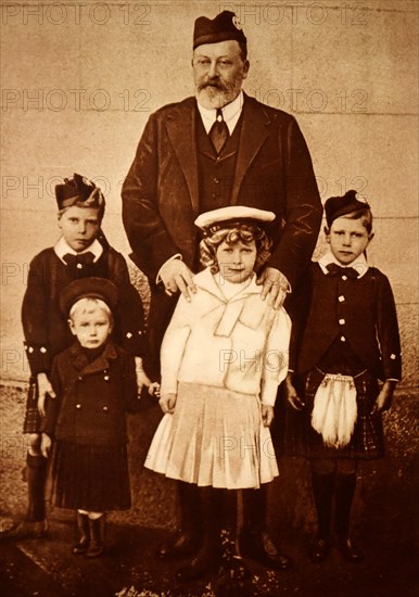 Photograph of King Edward VIII (1894-1972) with his grandchildren: Prince Albert Frederick Arthur George (1895-1952), Prince Henry, Duke of Gloucester (1900-1974), Mary, Princess Royal and Countess of Harewood (1897-1965) and Prince George, Duke of Kent (1902-1942). Dated 20th Century