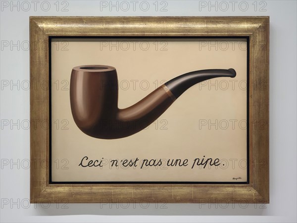 Painting 'La trahison des images' ('The Treachery of Images') by Belgian surrealist artist Rene Magritte (1929) on display at his retrospective exhibition in the Centre Pompidou in Paris, France. The French inscription 'Ceci n'est pas une pipe' means 'This is not a pipe'. The exhibition entitled 'Rene Magritte. The Treachery of Images' runs till 23 January 2017. After that the reformulated version of the exhibition will be presented at the Schirn Kunsthalle in Frankfurt am Main, Germany, from 10 February to 5 June 2017.