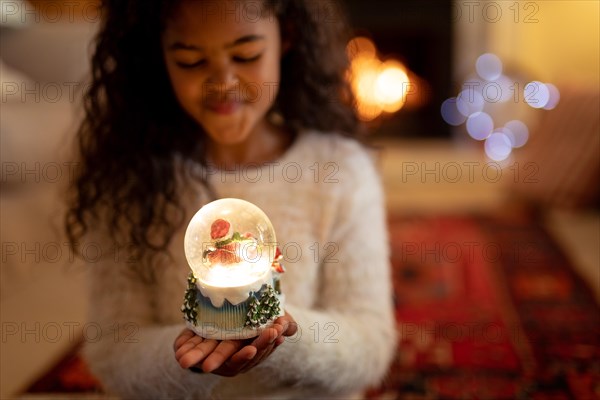 Girl at home at Christmas time