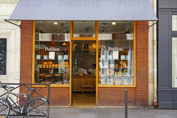 PARIS, FRANCE -22 JUL 2019- Bread loaf from the world famous Poilane bakery, located on rue du Cherche Midi in the 6th arrondissement of Paris.