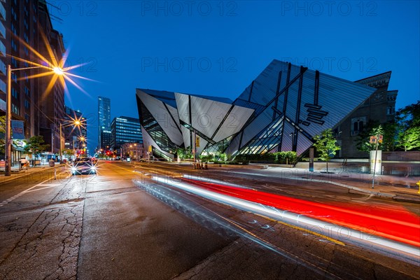 Night view of architectural landmark Royal Ontario Museum aka the ROM in Toronto, Ontario, Canada.