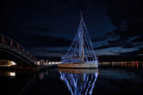 Volos, Greece 12-12-2020, decorated boats for the Christmas and New Year holidays