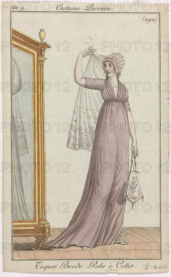 Journal des Dames et des Modes, Costume Parisien, 5 avril 1801, An 9, (292) : Toquet Brodé (...).Standing woman, next to a fitting mirror, with a 'toquet' with embroidery on the head. Veil with flower pattern. She is wearing a frock with raised collar and drag. Further accessories: reticule with women's figure, flat shoes with pointed noses. The print is part of the fashion magazine Journal des Laden et DES Moldes, published by Pierre de la Mésangère, Paris, 1797-1839.