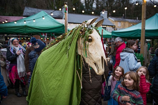 People in the village of Parkmill in Gower, Swansea, take part in the ancient Welsh tradition of celebrating the New Year in early January, using a Mari Lwyd, which is a horse's skull mounted on a pole. The custom is believed to have started in 1800 with groups of people following the Mari Lwyd from house to house across villages in South Wales. In recent years the event has gained in popularity with many events being held across Wales to help revive the tradition.