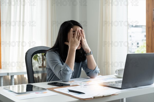 Tired stressed businesswoman feeling strong headache massaging temples exhausted from overwork, fatigued overwhelmed lady. Executive worker suffering