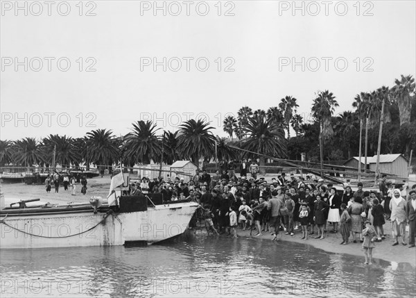 The Royal Navy during the Second World War- Operation Torch, North Africa, November 1942 Some of the inhabitants of Arzeu, meet the US soldiers on the beach.