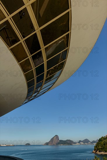 Museum of Contemporary Art, Niteroi, with sugar bread in the background, Rio de Janeiro, Brazil on September 01, 2022.