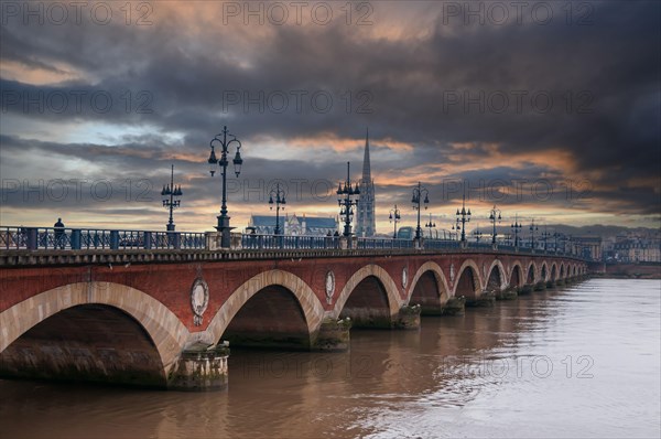 The stone bridge in Bordeaux, in the rain, in Gironde, New Aquitaine in France