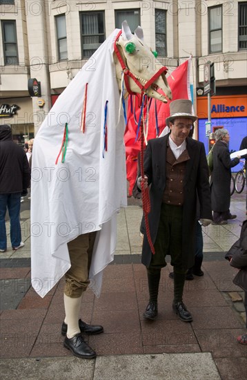 Welsh Language Society, Cymdeithas yr iaith Gymraeg, protest with Mari Lwyd in Cardiff City Centre, South Wales, UK