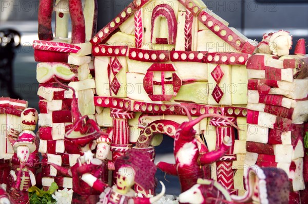 Two holidays in one: Dia de los Muertos carved in radishes for Noche de Rabanos, Oaxaca, Mexico.