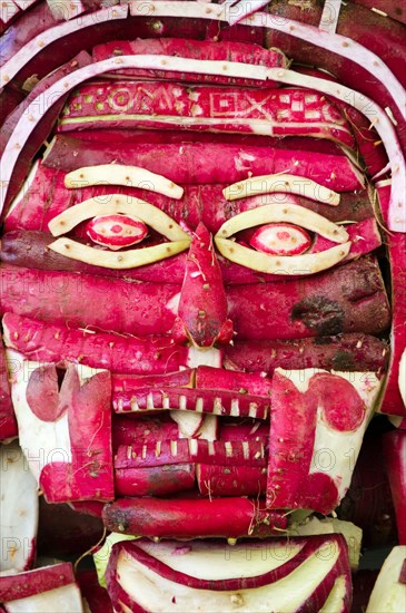 Mictlantecuhtli, the Mixtec God of Death, carved from radishes for Noche de Rabanos, Oaxaca, Mexico.