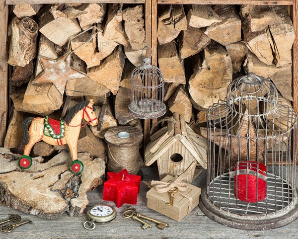 retro style christmas decoration with red candles and rocking horse. vintage home interior