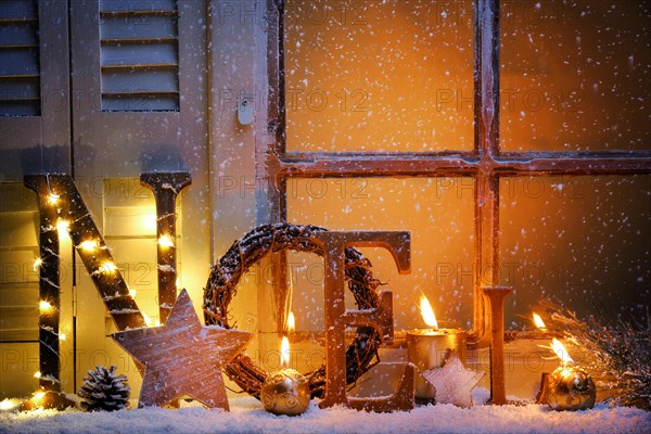 Frosted window with Christmas decoration