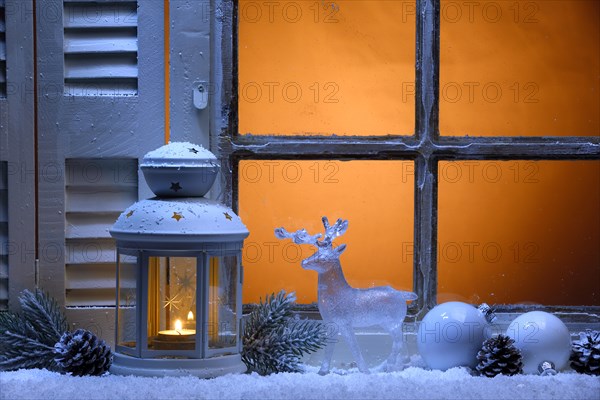 Frosted window with Christmas decoration