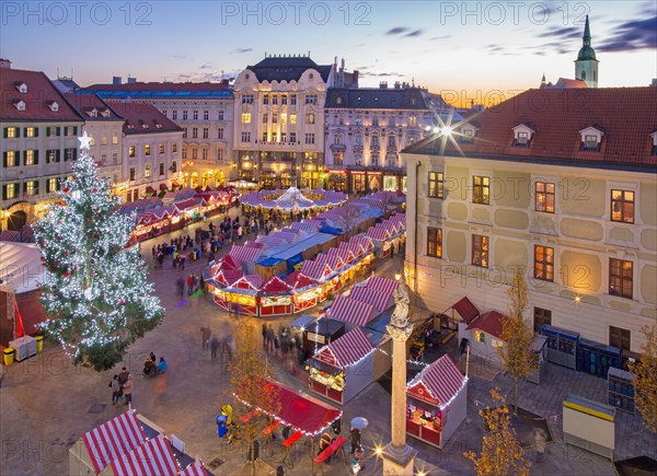 BRATISLAVA, SLOVAKIA - NOVEMBER 28, 2016: Christmas market on the Main square in evening dusk.