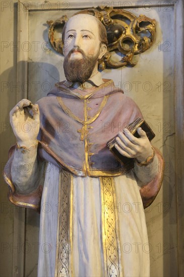 Les Plagnes baroque chapel. Saint Francis de Sales statue. France.