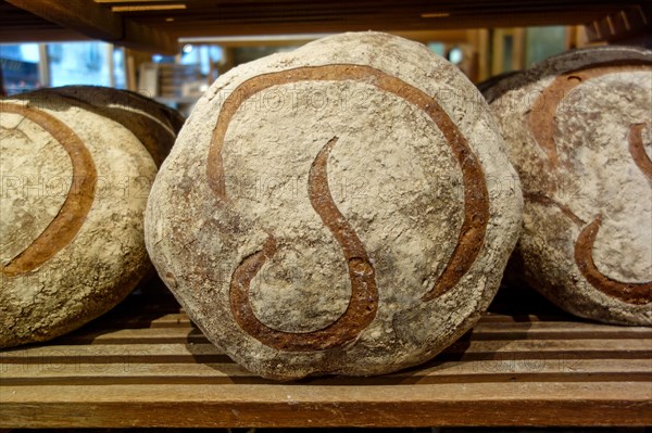 Jan 2, 2018 - The trademark "P" on a round sourdough country bread referred to as a miche or pain Poilâne in Paris, France